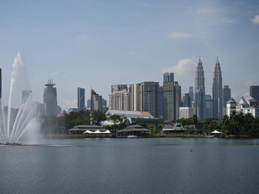 Malaysia's landmark Petronas Twin Towers and other commercial buildings are pictured in Kuala Lumpur on July 21, 2022.
