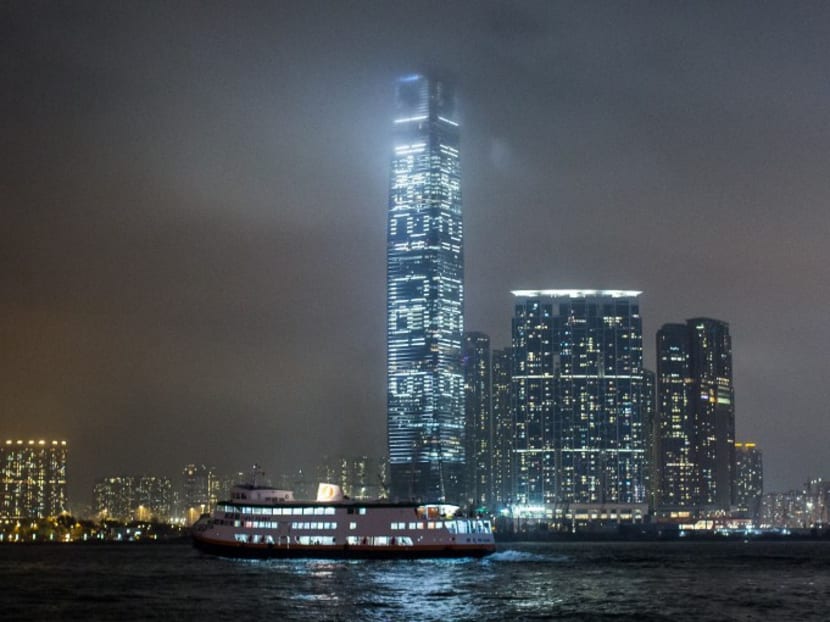 A light show seen on the facade of the International Commerce Center, Hong Kong's tallest building, featuring a countdown of seconds remaining until July 1, 2047. Photo: AFP