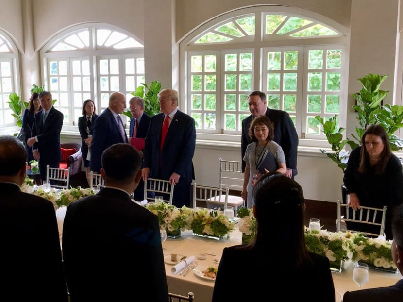 US and North Korean delegations gather for a working lunch at Capella Hotel on June 12, 2018.