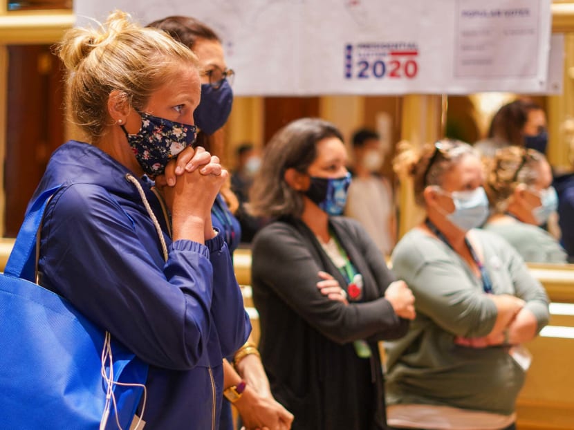 Americans at a 2020 US presidential election watch party held by the American Chamber of Commerce in Singapore at Conrad Centennial Singapore hotel on Nov 4, 2020.