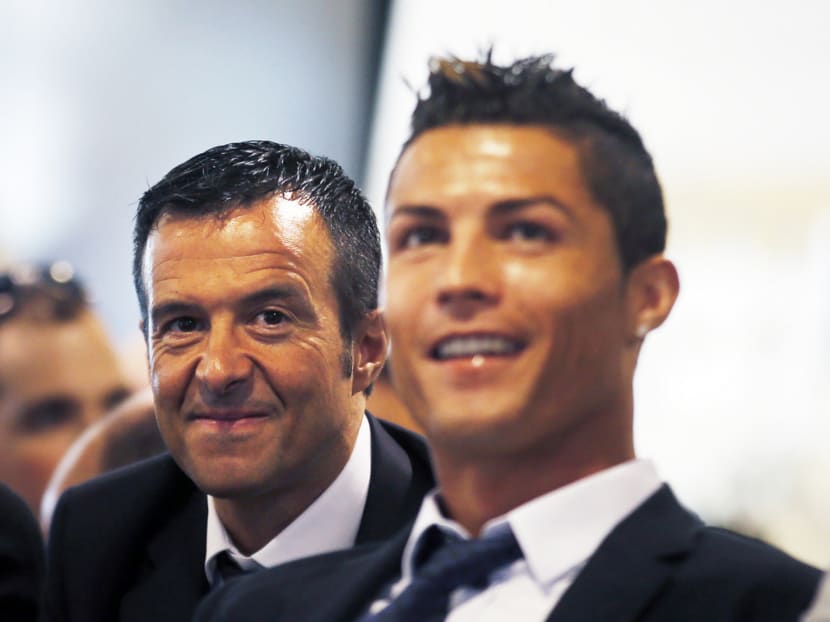 Jorge Mendes (left) is agent to many football stars, including Cristiano Ronaldo (right). Photo: Reuters