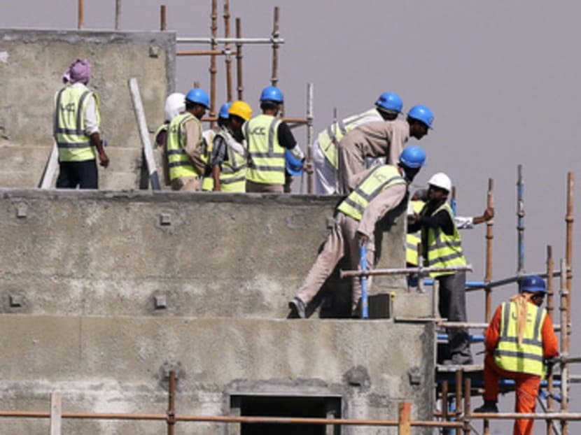 Widespread reports of human rights violations among migrant workers in Qatar has prompted a review of its labour legislation. PHOTO: GETTY IMAGES