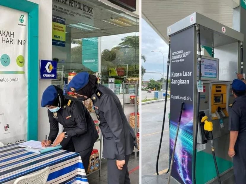 Malaysia government officials doing enforcement checks at Johor Bahru petrol stations.
