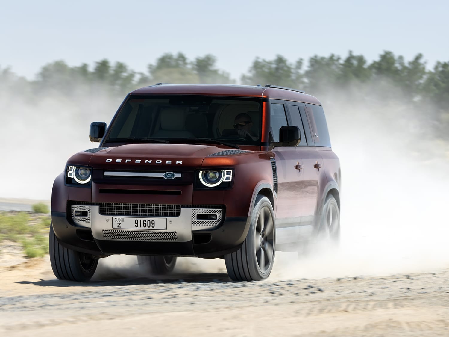 Review: We Tackled the Dunes of Dubai in the Land Rover Defender 130 – Robb  Report