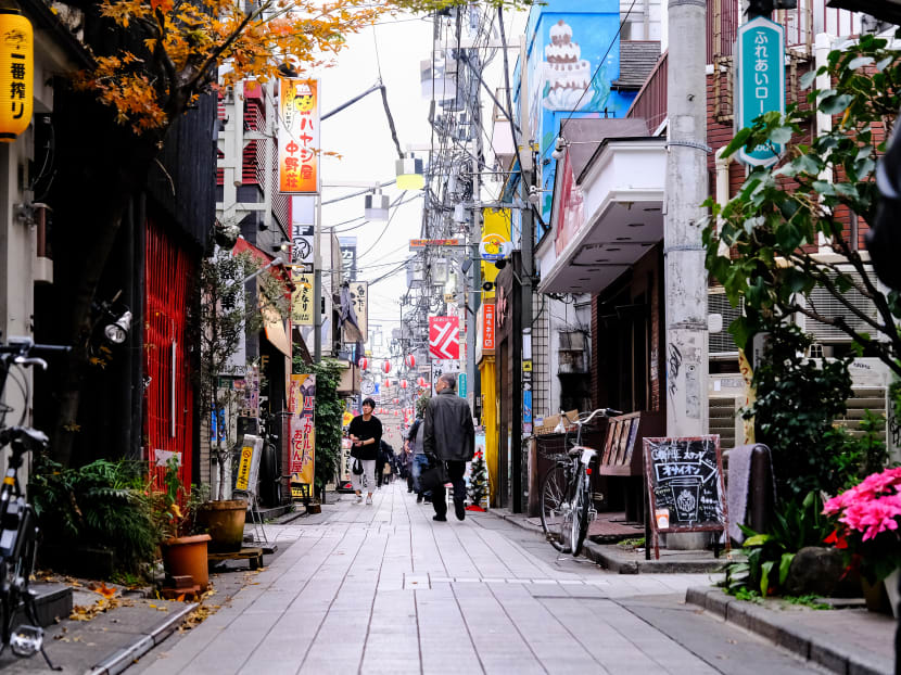 Nakano backstreets near Nakano Beer Kobo in Tokyo on Dec 6, 2019. A trip to Tokyo will have to wait for the millions of people who cancelled flights and hotel bookings — but there are ways to bring you closer to the sometimes impenetrable, always fascinating, city.