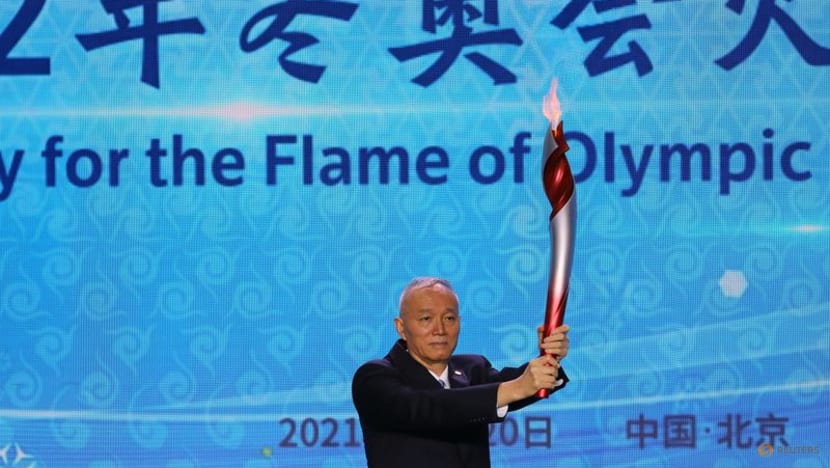 Beijing lights flame, to be first city to host summer, winter games Beijing lights flame, to be first city to host summer, winter games