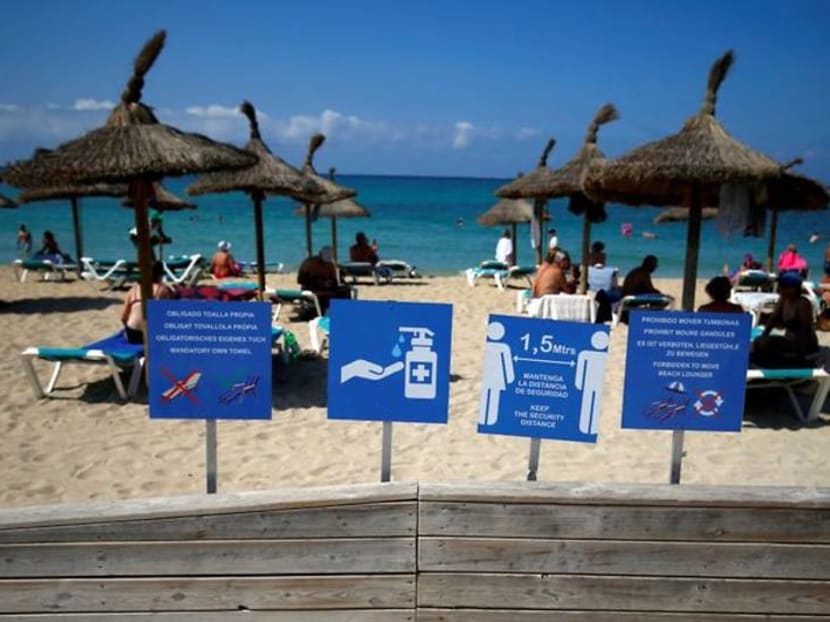 Locked-down Spaniards seethe with envy as Germans flock to Mallorca Locked-down Spaniards seethe with envy as Germans flock to Mallorca