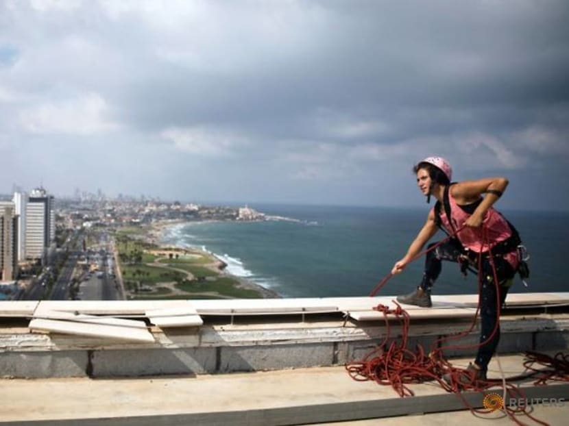 Squeegee selfies: Tel Aviv tower-washer is rising TikTok star Squeegee selfies: Tel Aviv tower-washer is rising TikTok star