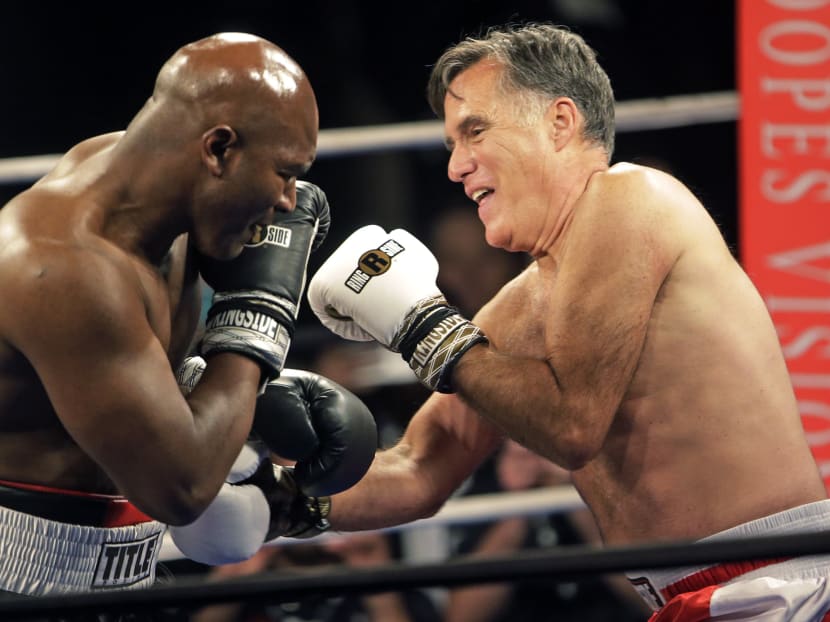 Mitt Romney lasts 2 rounds against Evander Holyfield in boxing match