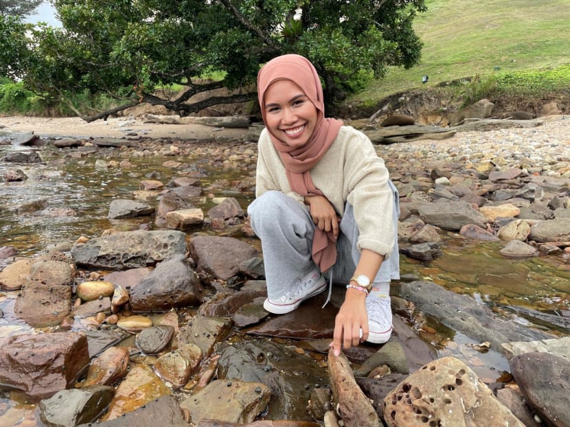 The writer (pictured) on a field trip along Brunei’s rocky shores. 