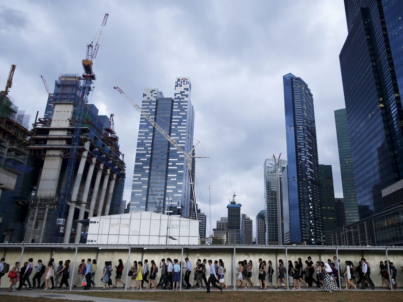 With Singapore firms constrained by the labour crunch, corporate leaders urged the Government to exercise greater flexibility such as having larger quotas as a 'transitional arrangement' for certain sectors. Photo: Reuters