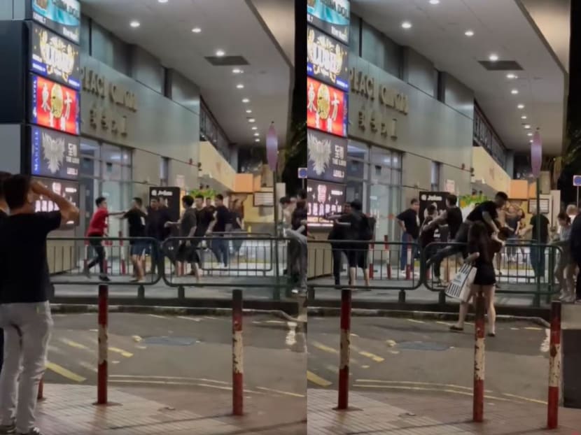 In a video uploaded to Facebook by Mr Patrick Tan, a group of more than 15 people can be seen gathered outside Peace Centre where a fight was ongoing, with some trying to disperse the group and calm the situation down.