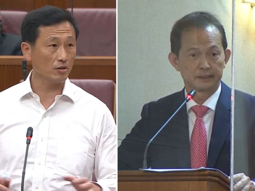 Transport Minister Ong Ye Kung (left) and Non-Constituency Member of Parliament Leong Mun Wai in Parliament on Feb 25, 2021.