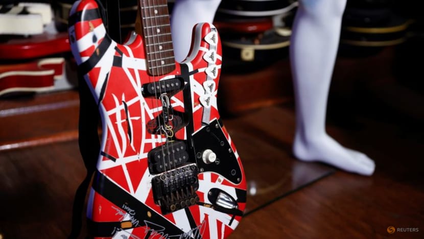Eric Clapton, Elvis Presley guitars hit the auction block Eric Clapton, Elvis Presley guitars hit the auction block