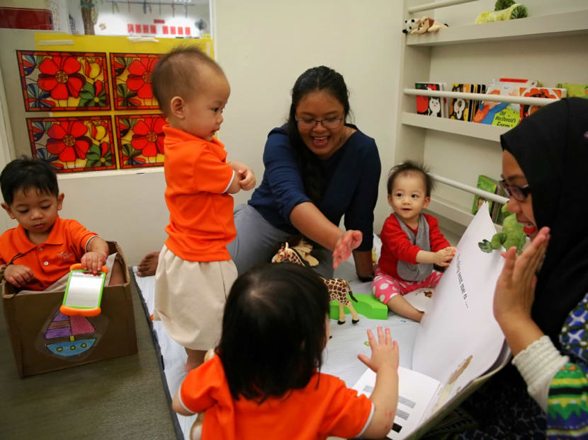 Older toddlers and younger infants learning together at My First Skool at Havelock Road as part of a co-sharing pilot for infants and toddlers. Photo: Nuria Ling/TODAY