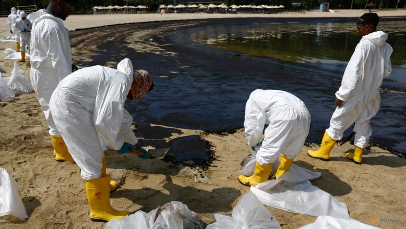 Sentosa deploys about 100 workers to beef up beach cleaning efforts after oil spill Sentosa deploys about 100 workers to beef up beach cleaning efforts after oil spill