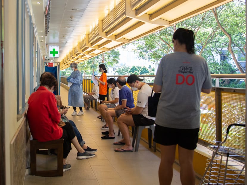 Patients are seen outside a clinic at Tiong Bahru on Feb 25, 2022.