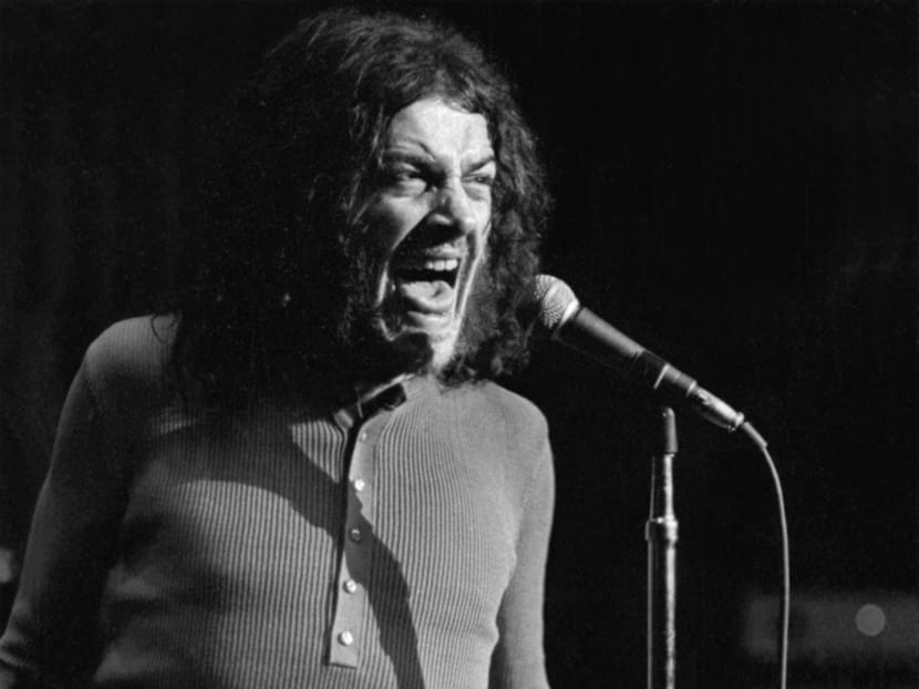 FOR ONE TIME USE ONLY WITH OBITUARY - In this June 1970 photo released by Linda Wolf, British singer Joe Cocker performs during the Joe Cocker - Mad Dogs & Englishmen tour and traveling party. Cocker, the raspy-voiced British singer known for his frenzied cover of “With a Little Help From My Friends,” and the teary ballad “You Are So Beautiful,” died of lung cancer on, Monday, Dec. 22, 2014 in Colorado. He was 70. (AP Photo/www.lindawolf.net, Linda Wolf)