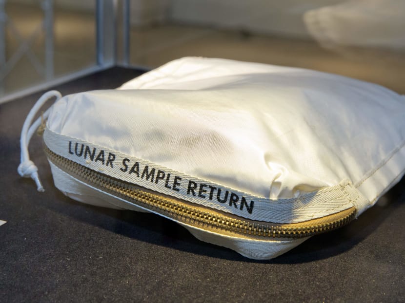 The Apollo 11 Contingency Lunar Sample Return Bag used by astronaut Neil Armstrong, to be offered at auction, is displayed at Sotheby's, in New York,  Thursday, July 13, 2017. Photo: AP