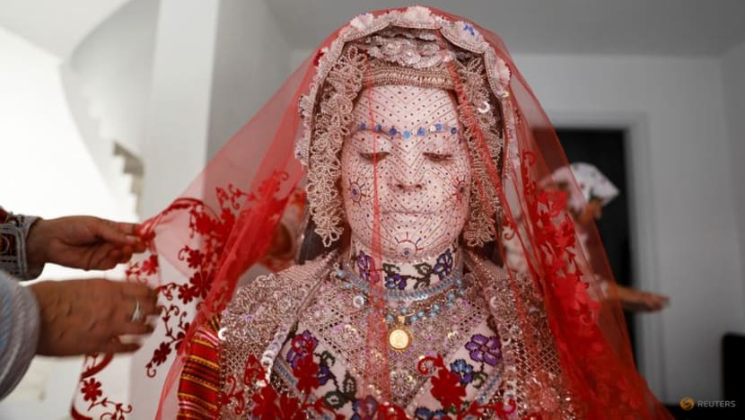 Face paint and folklore transform Chicago bride for traditional wedding in Kosovo Face paint and folklore transform Chicago bride for traditional wedding in Kosovo