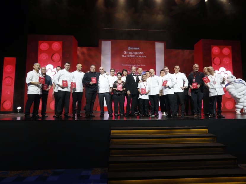 The recipients of the Michelin stars gather onstage to celebrate their accolades. Photo: Ernest Chua