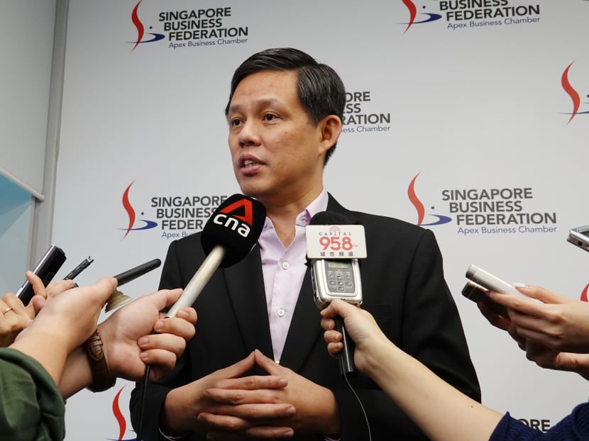 Trade and Industry Minister Chan Chun Sing speaking to the media on Feb 14, 2020.
