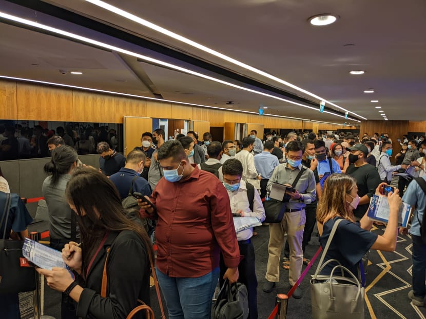 Jobseekers seen queuing to visit recruitment booths at the OneAviation Careers event on May 27, 2022.