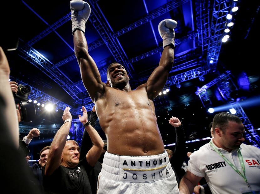 Joshua survived being knocked down in the sixth round to break Klitschko’s resistance in the 11th. Photo: Reuters