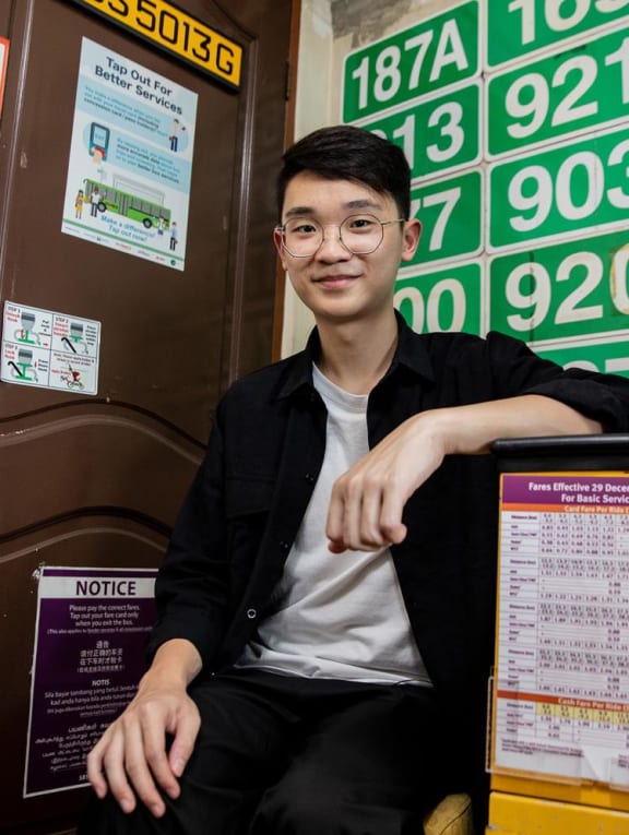 Mr Matthew Tay in his bedroom, which is full of bus memorabilia, on Aug 18, 2022.