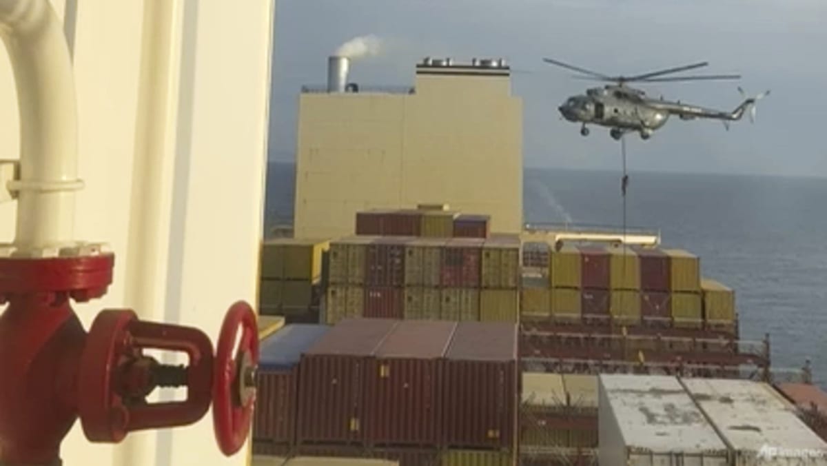 Vessel seized in Strait of Hormuz amid Iran tensions, shipping firms say