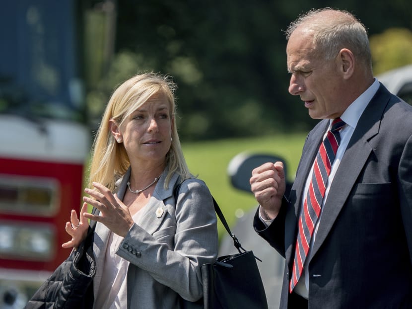 White House Chief of Staff John Kelly and Deputy Chief of Staff Kirstjen Nielsen speak together as they walk across the South Lawn of the White House in Washington. President Donald Trump is expected to nominate Kirstjen Nielsen as his next Secretary of Homeland Security. AP file photo