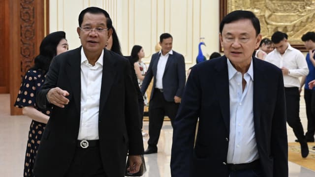 推迟返泰计划 达信出席柬埔寨首相洪森生日派对
