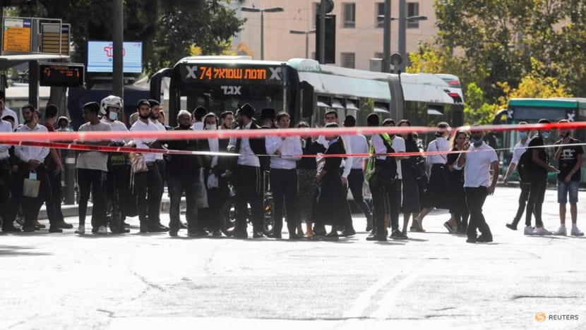 Palestinian stabs two in Jerusalem shop before being shot, Israeli police say Palestinian stabs two in Jerusalem shop before being shot, Israeli police say