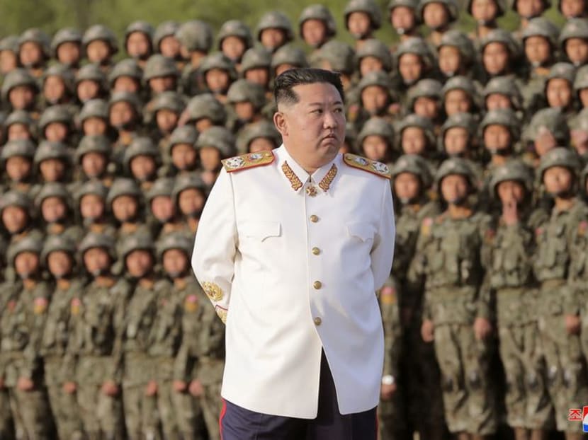 FILE PHOTO: North Korean leader Kim Jong Un meets troops who have taken part in the military parade to mark the 90th anniversary of the founding of the Korean People's Revolutionary Army, in this undated photo released by North Korea's Korean Central News Agency (KCNA) April 29, 2022. KCNA via REUTERS