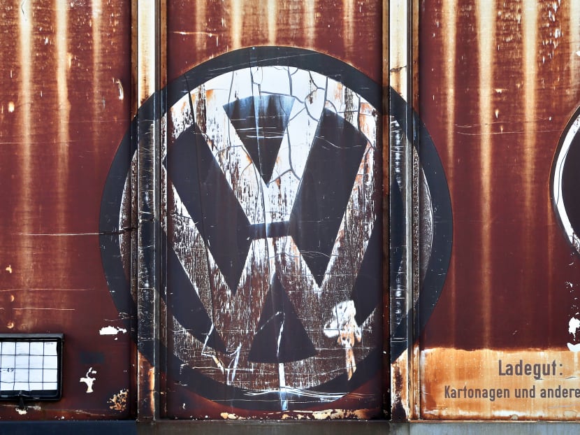 A Volkswagen logo is seen on a freight car at the VW factory in Zwickau, Gemany. Photo: Jan Woitas/dpa via AP