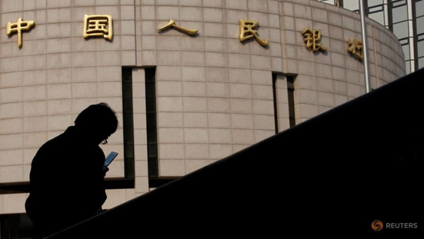 China central bank tries to soothe market nerves after SOE debt shocks