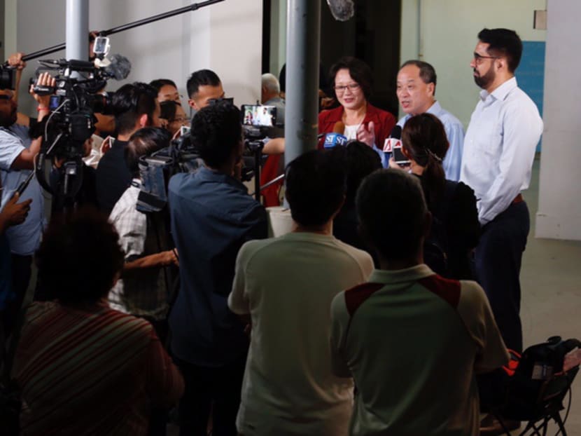 Mr Pritam Singh, Mr Low Thia Khiang and Ms Sylvia Lim, from the Workers' Party, speaking to the media ahead of a MPS session at the Blk 713 along Bedok Reservoir road on 26th July. Photo: Najeer Yusof/TODAY
