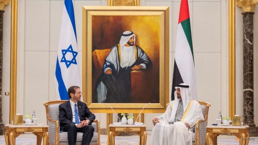 UAE intercepts a Houthi missile as Israeli president visits UAE intercepts a Houthi missile as Israeli president visits