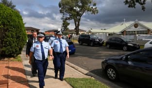 Teenager charged with terrorism over Sydney bishop stabbing 