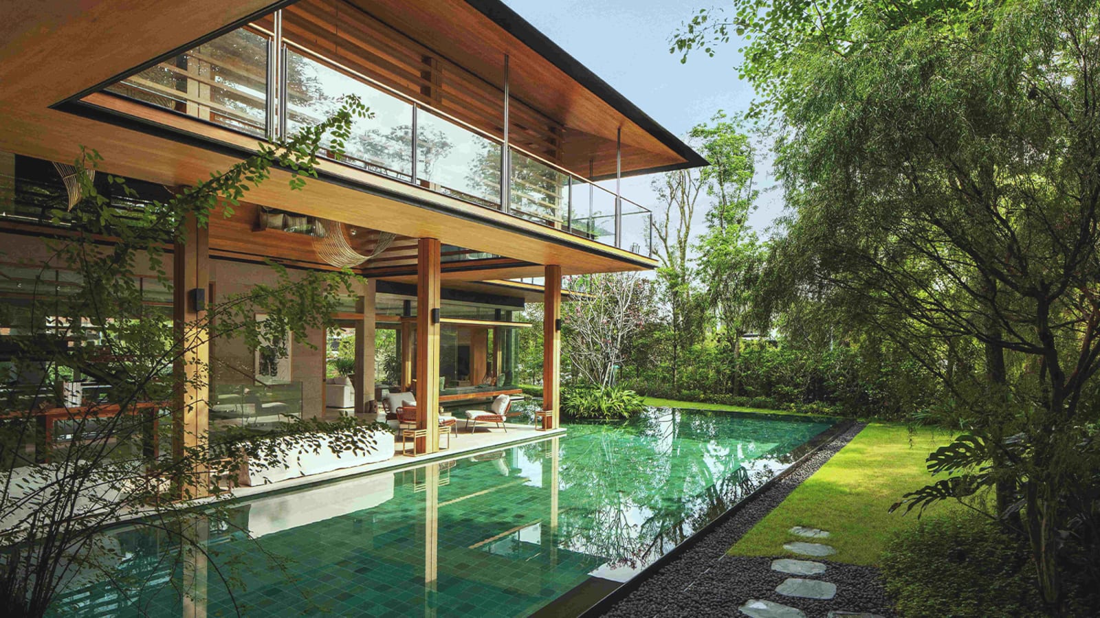 This bungalow in Singapore is surrounded by lush greenery with interiors inspired by the owner’s Hakka roots
