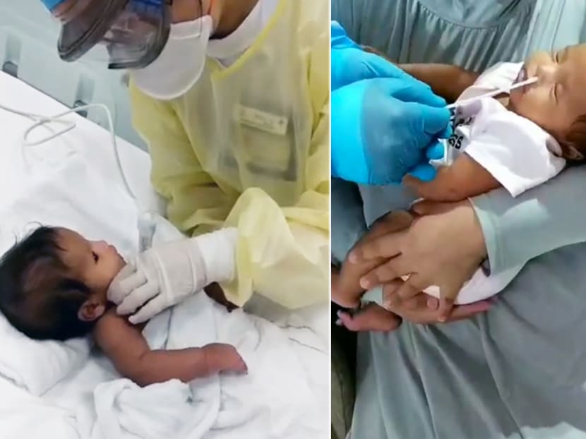 Madam Siti Hawa said that one of the most heartrending moments was seeing her newborn (pictured), who was infected with Covid-19, undergoing repeated rounds of nasal swab tests and having her blood drawn.