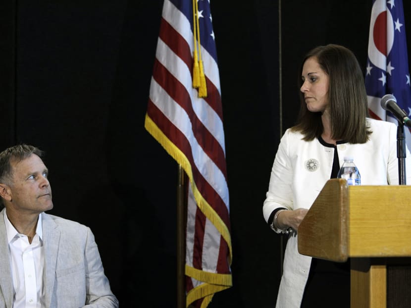 Fred Warmbier (left), father of Otto Warmbier, listening to Kelly Martin, Senior Director of Communication University of Cincinnati Medical centre, updating the media on his son's condition at a press conference on June 15, 2017 in Wyoming, Ohio. Photo: AFP