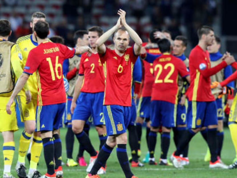 After two straight wins, defending champions Spain are through to the knockout stages of Euro 2016. Photo: AP