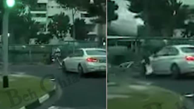 过马路被轿车撞飞 脚踏车骑士送院