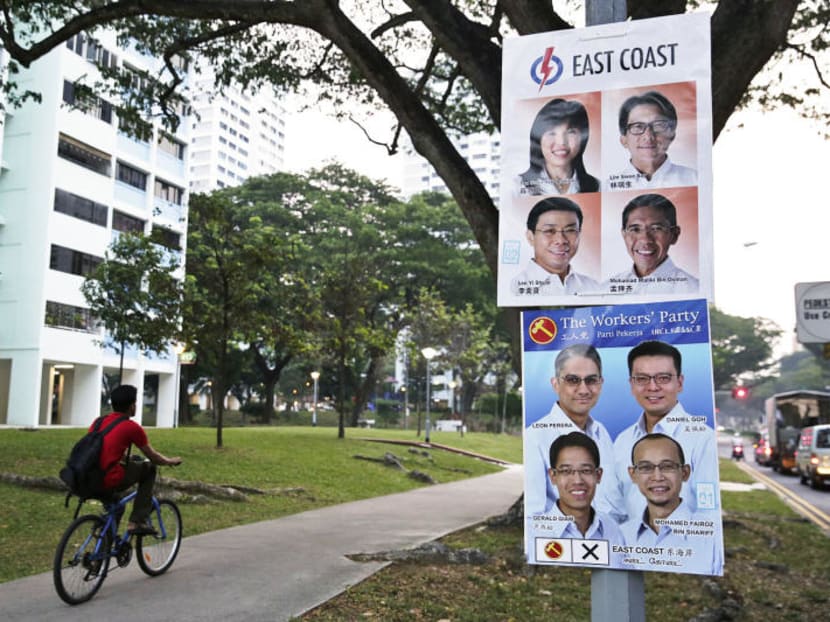 Campaign posters for People's Action Party and Workers' Party candidates in East Coast Group Representation Constituency in 2015.