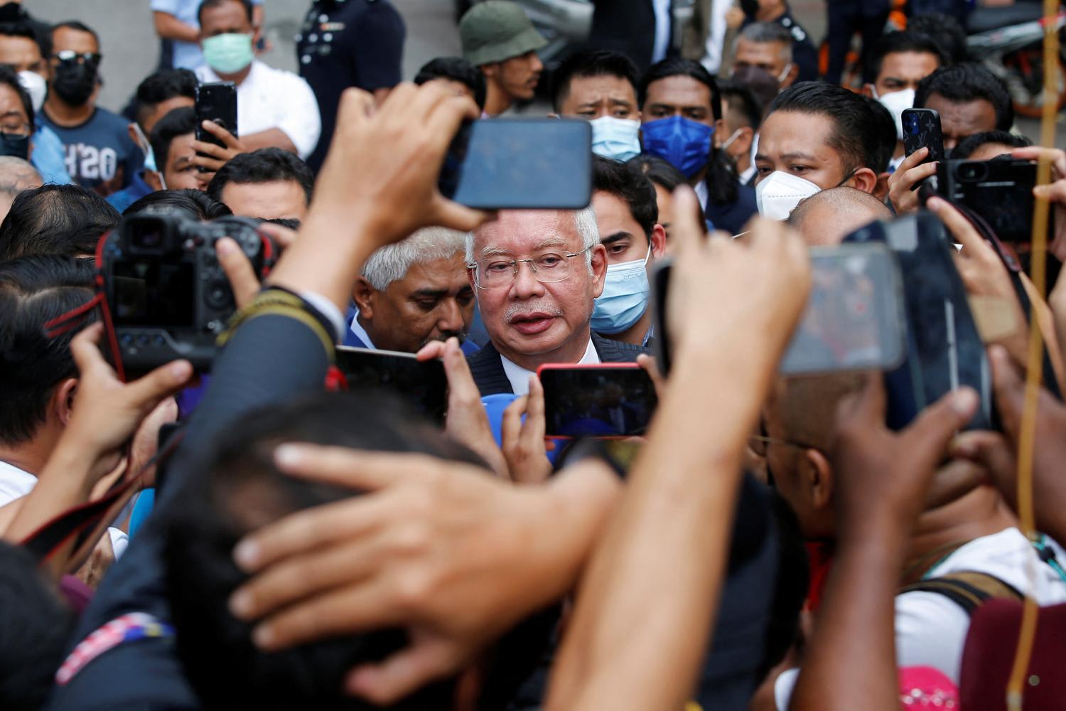 Former Malaysian prime minister Najib Razak speaks to journalists outside the Federal Court during a court break, in Putrajaya, Malaysia on Aug 23, 2022. 
