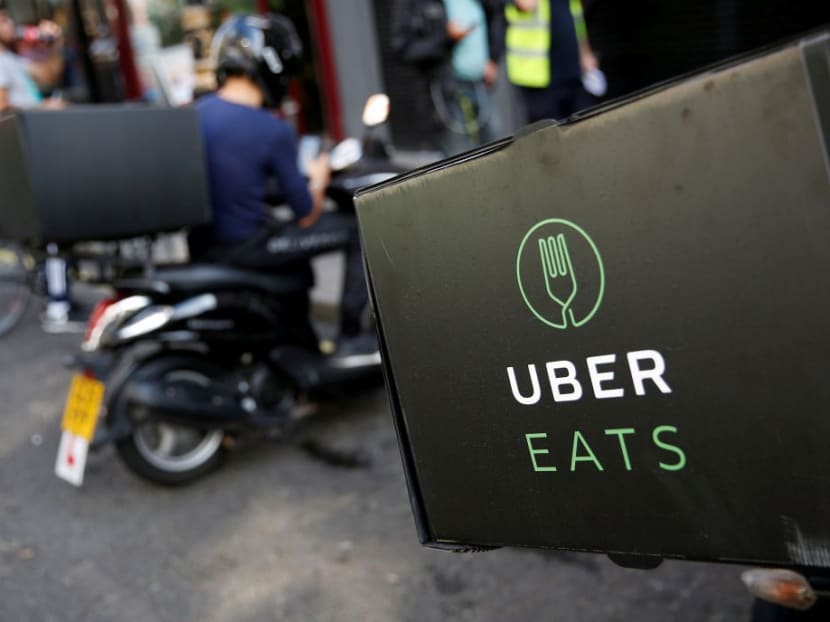An UberEATS food delivery scooter. More Uber customers in Singapore, including those using its food delivery service UberEATS, have come forward with reports of fraudulent credit card transactions. Reuters file photo.