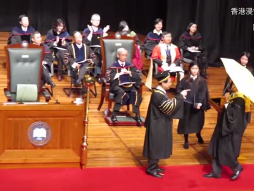 Screengrab of YouTube video showing Professor Chan refusing to present degree to student.
