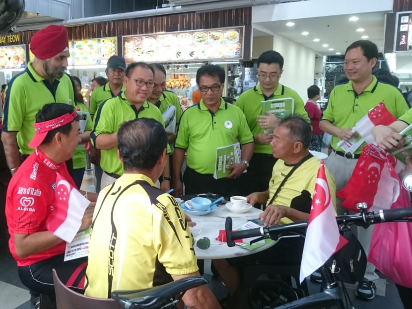 SDA chairman Desmond Lim (standing, second from left) talking to residents in Sengkangearlier this month. The party may contest in Pasir Ris-Punggol GRC. Photo: Kelly Ng