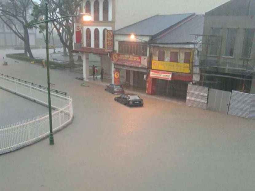 Kuching city centre seen underwater as heavy overnight rain takes a toll on roads. Photo: The Malaysian Insider